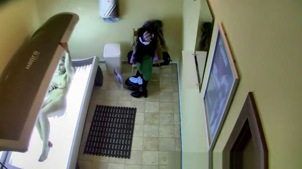 Blonde walks through solarium with hairy pussy caught on hidden cam on breastful.com