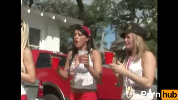 Two young lesbians flash bare skin and grind in public during a wild street party on breastful.com