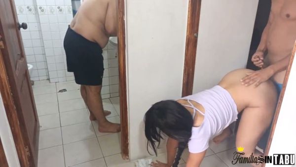 Blonde with huge tits gets oral from one man while another watches in a tiled bathroom on breastful.com