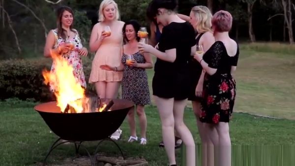 Australian lesbians get intimate around a campfire in the woods - Australia on breastful.com