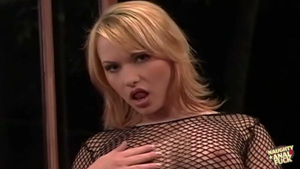 Blonde in sheer fishnets rides her lover in a dimly lit private room on breastful.com