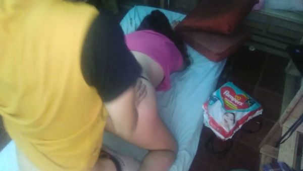 Red-haired MILF in pink top and black thong takes her man from behind on breastful.com