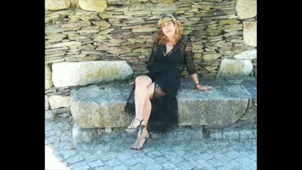 Red-haired submissive bound in intricate rope during Portuguese domination session on breastful.com