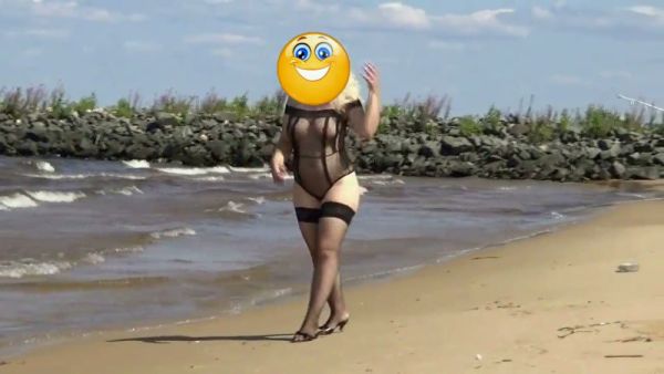 Mature Russian woman pleasures herself on a secluded sandy beach - Russia on breastful.com
