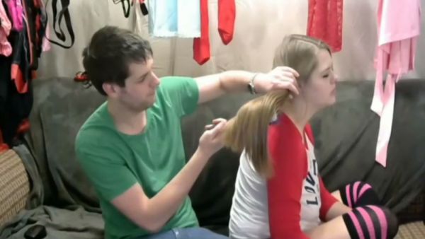 Young blonde lets him pull her long hair during an intimate webcam moment on breastful.com