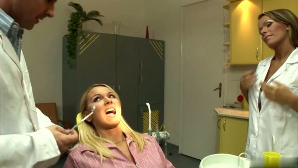Blonde with big tits gets anal in the dentist's office on breastful.com
