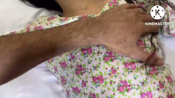 Indian beauty in floral dress with wet hair explores intimacy on white sheets - India on breastful.com