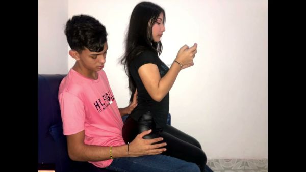 Brunette caught in passionate climax during intimate encounter on leather couch on breastful.com