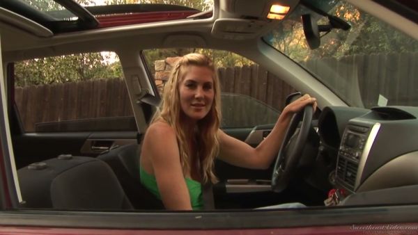 Two blonde lesbians share intimate moments outdoors on a gravel patch on breastful.com
