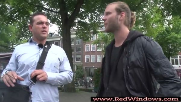 Two men share intimate moments in a Dutch cityscape - Netherlands on breastful.com
