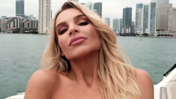 Blonde with big tits teases alone on a rocking boat at sunset on breastful.com