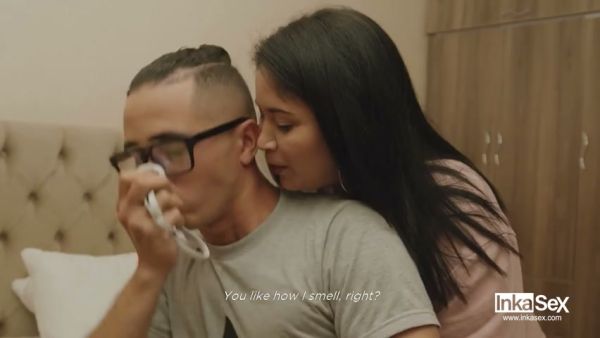 Two women caught in a passionate kitchen encounter on breastful.com