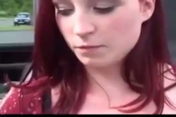 Redheaded MILF shares intimate moments with a woman and man in a car on breastful.com