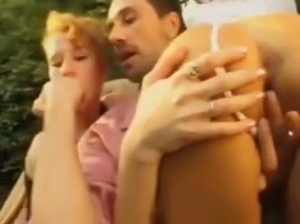 Mature blonde takes anal from her partner while two women join in the garden on breastful.com