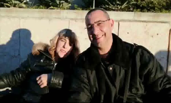 Mature European woman enjoys a quiet smoke amidst rocky cliffs and intimate moments on breastful.com