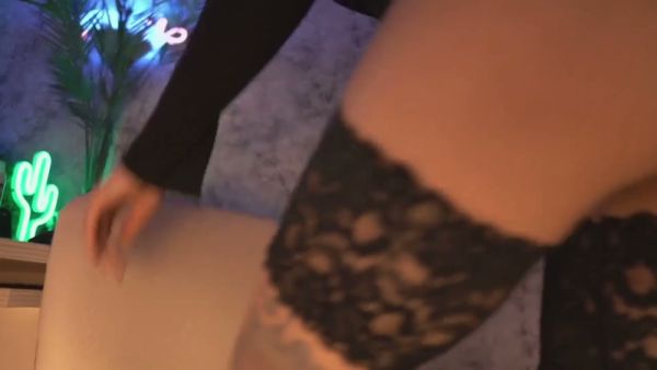 Tattooed woman with bold facial ink intensifies her solo session with a black vibrator on breastful.com