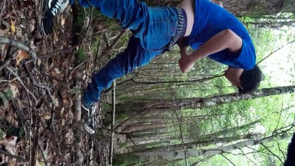 Young man jacks off openly in a sunlit forest clearing on breastful.com