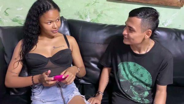 Latina woman enjoys passionate cunnilingus from a dark-skinned man on a leather couch on breastful.com