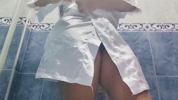 Plump brunette caught on hidden camera during an intimate bathroom moment in a hotel on breastful.com