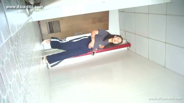 Young Chinese woman unknowingly filmed urinating in a white-tiled bathroom - China on breastful.com