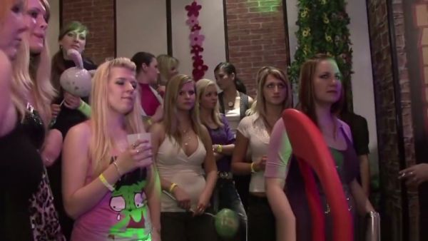 Blonde and redhead perform oral sex at a crowded nightclub party on breastful.com
