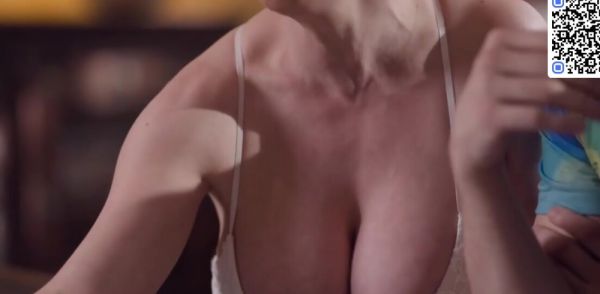 Busty cougar flashes off her hefty all-natural tits in red lace panties on breastful.com