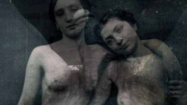 Hairy mature men share intimate moments in vintage-styled erotic scene on breastful.com