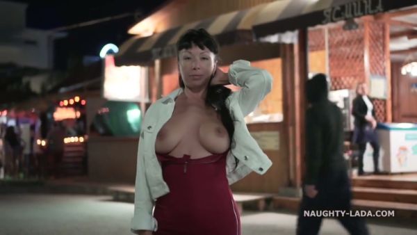 Confident brunette MILF exposes herself on the beach and in public spaces on breastful.com