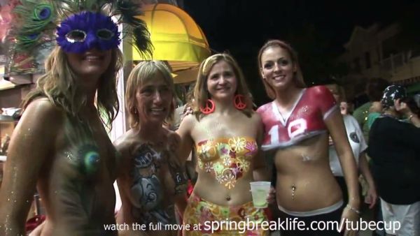 Blonde teens show off elaborate body paint at a Key West festival on breastful.com