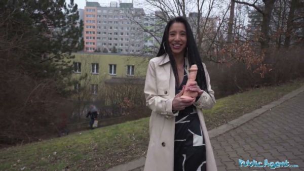 Asian woman deep-throats a realistic dildo on a public pathway on breastful.com